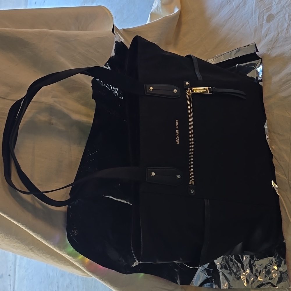 Michael Kors multi use handbags